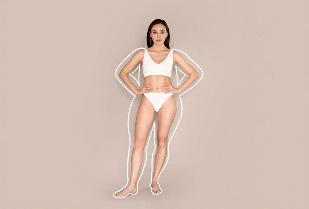 Fit, slim woman revealing her post-CoolSculpting Elite figure, with an outline of her former, larger shape around her